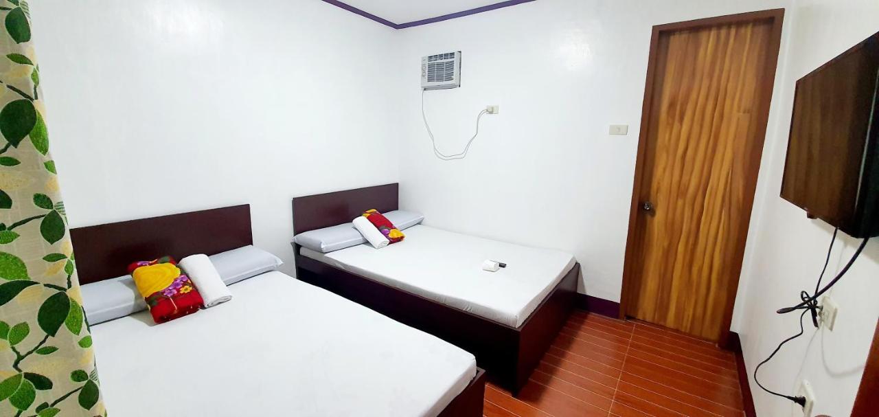 Sj Pabua Travellers Inn Mambajao Exterior photo